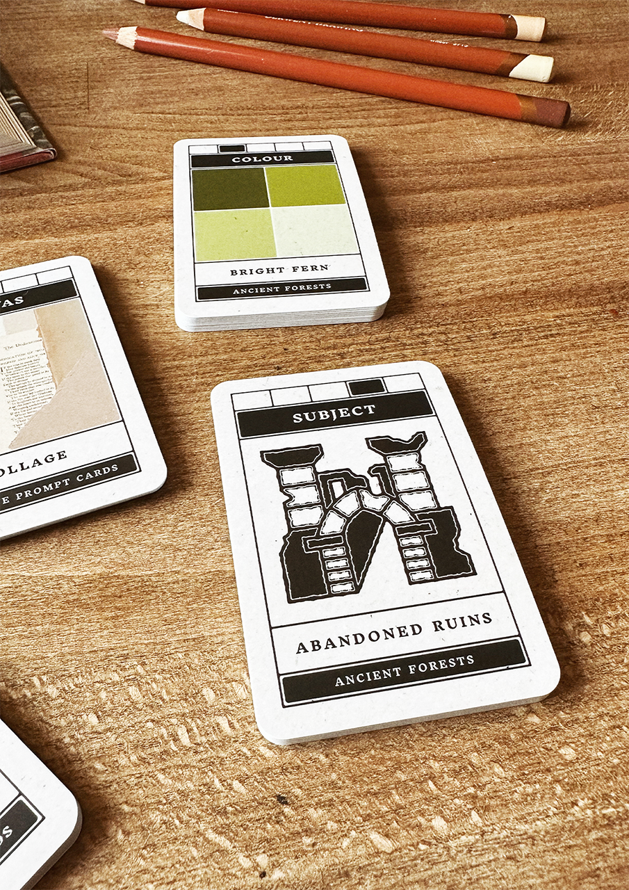 Playing cards with design elements on a wooden surface