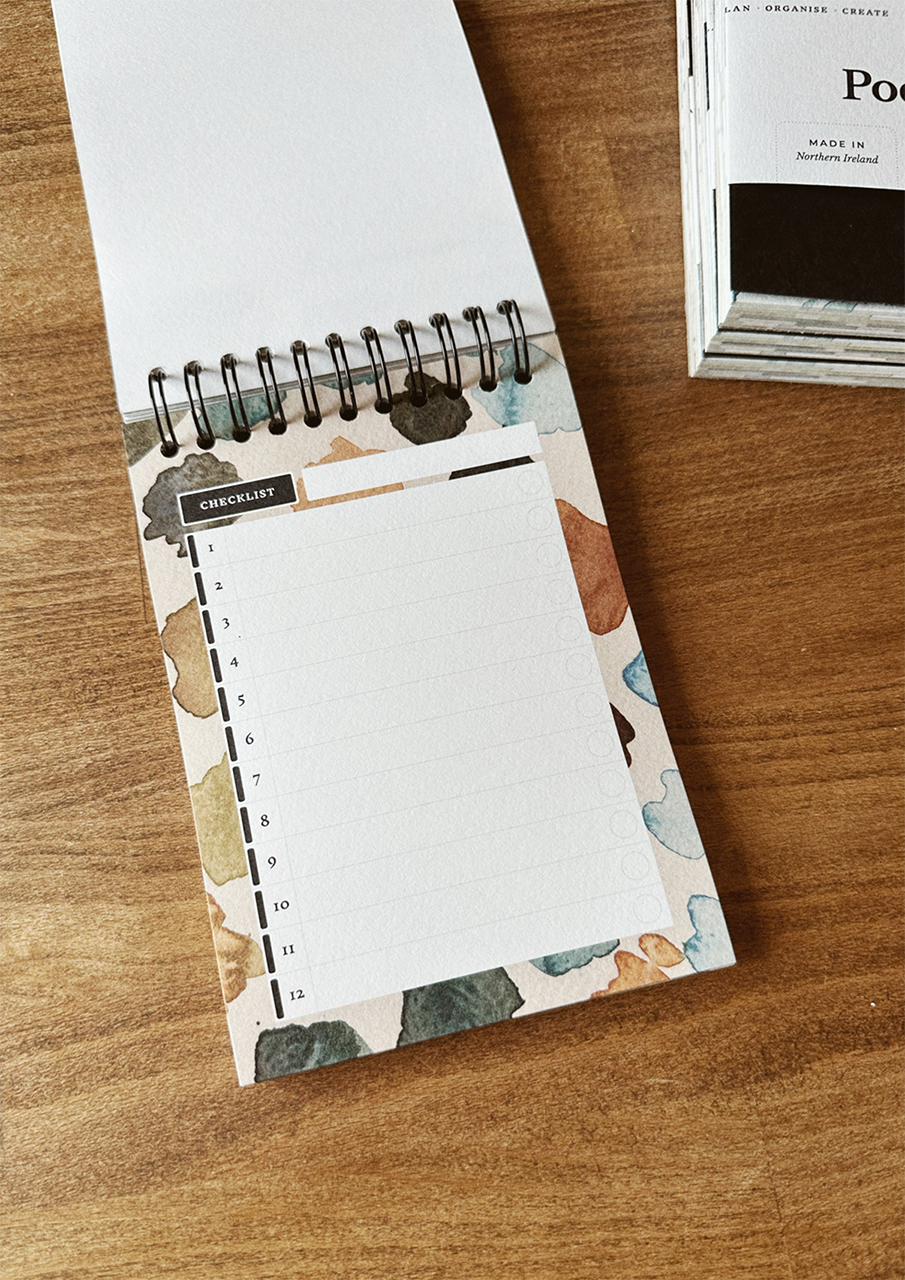 Open pocket book on wooden table