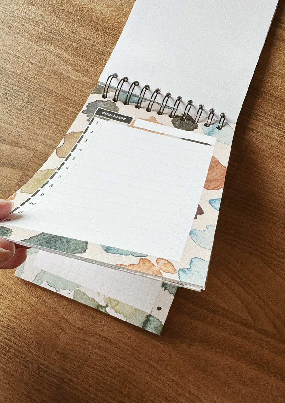 Open pocket book on wooden table