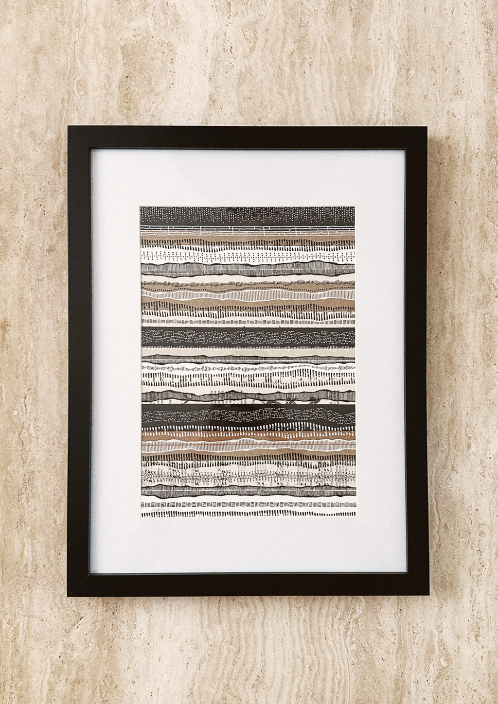 Framed original artwork featuring a collage of music-inspired patterns in shades of white, black, and beige, encased in a wooden and glass frame.