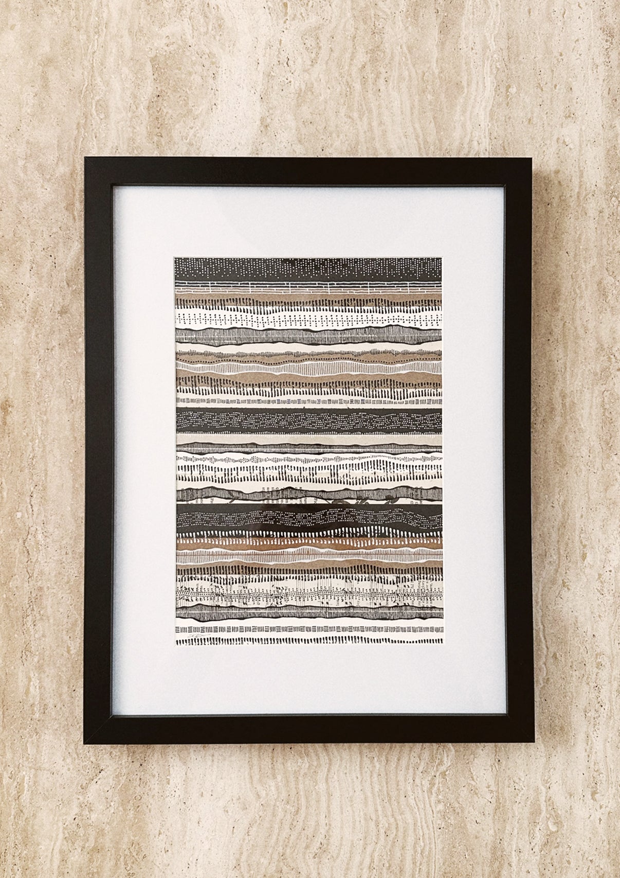 Framed original artwork featuring a collage of music-inspired patterns in shades of white, black, and beige, encased in a wooden and glass frame.