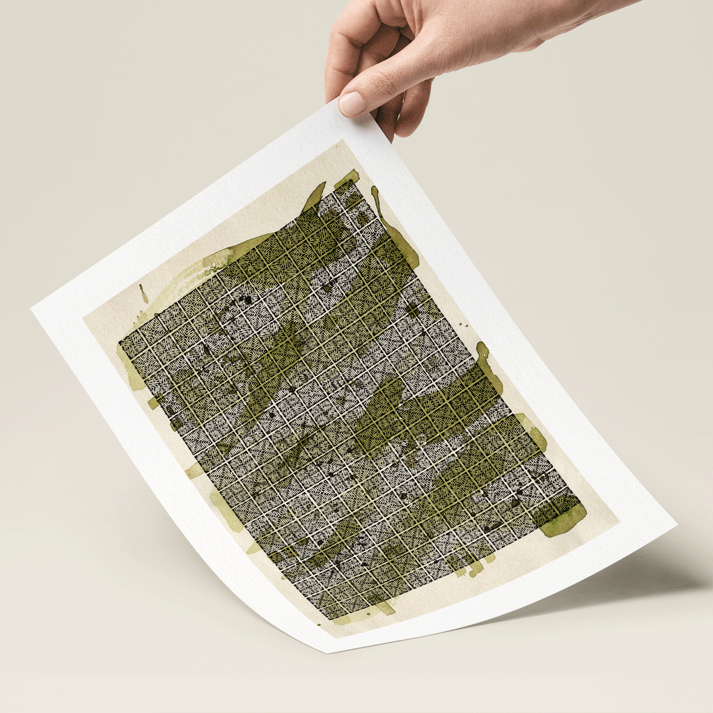 Abstract illustration in green and black print held in hand