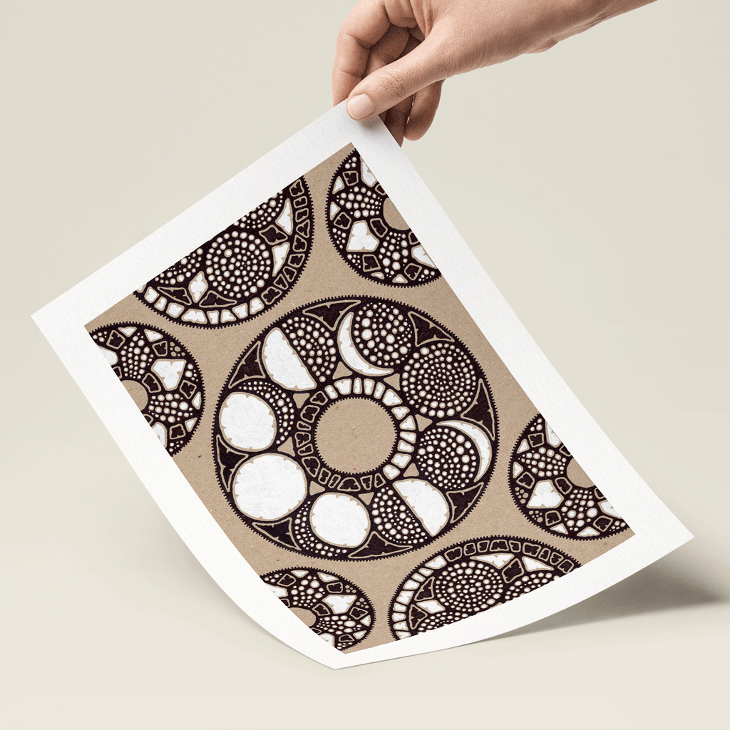 Abstract illustration in brown, black and white print held in hand