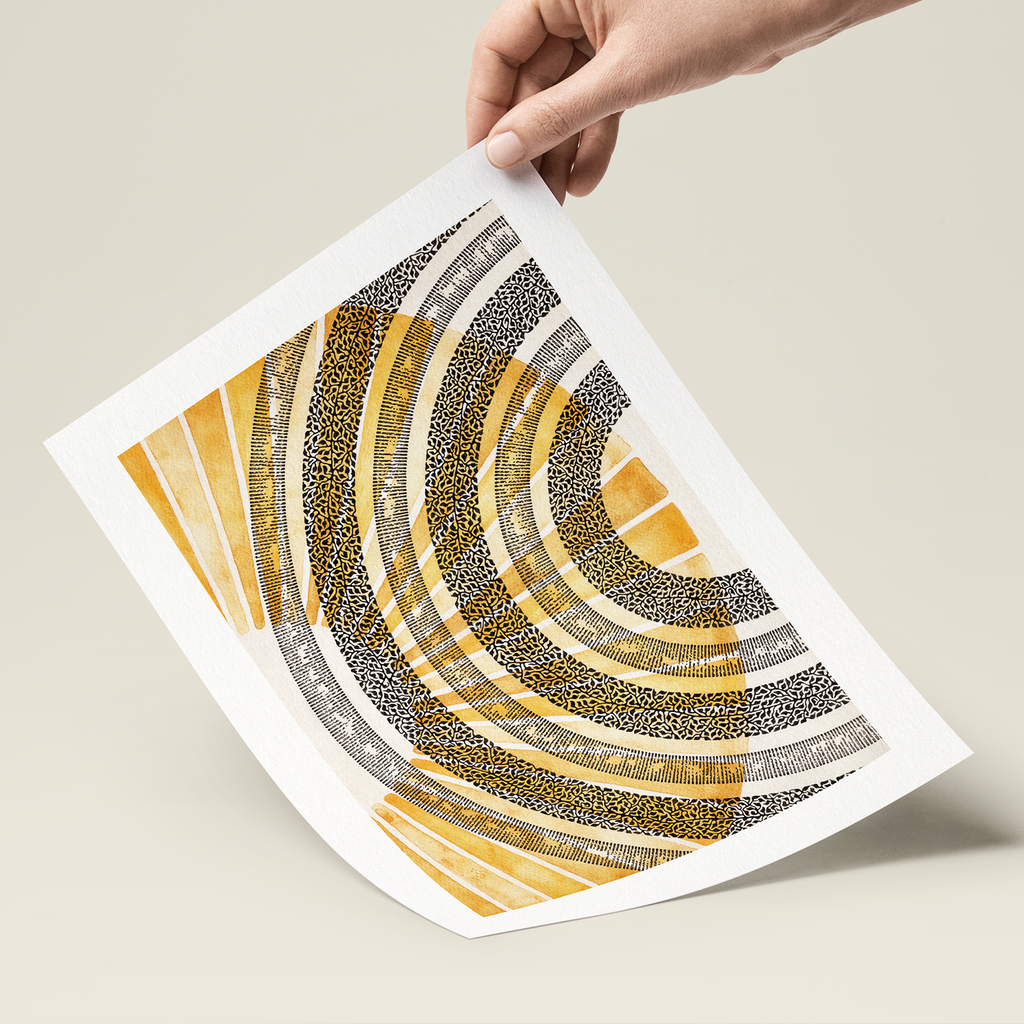 Hand holding a piece of paper with a geometric pattern on a beige background